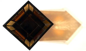 Top-down view of stained-glass votive candle holder