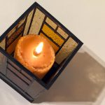 Top three quarter view of stained-glass votive candle holder