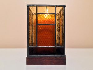 Front view of stained-glass votive candle holder